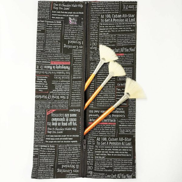 Accessory waterproof bag. Toiletry bag. Newspaper print